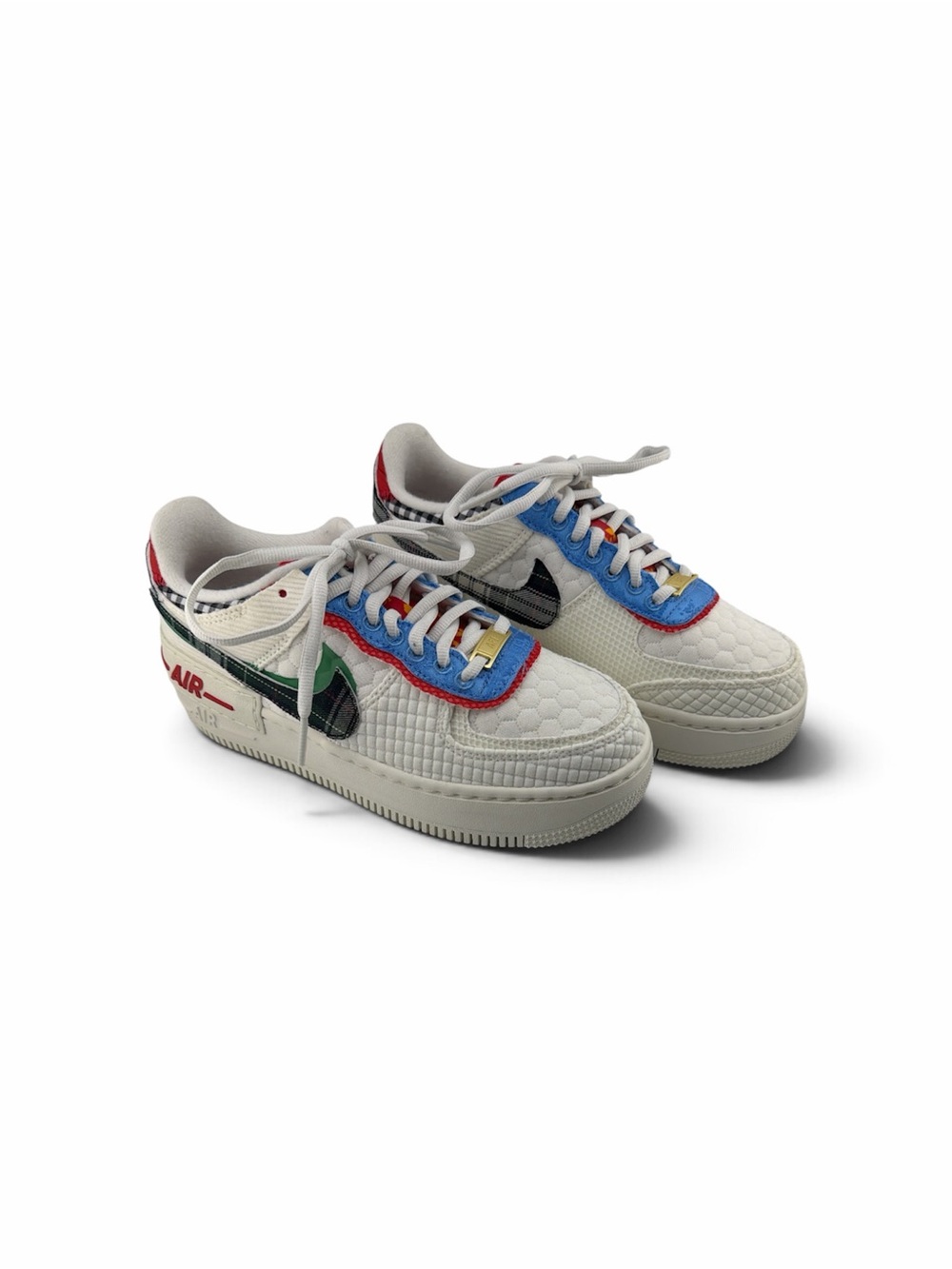 Nike Women’s White Sneakers with Red, Blue, Green and Black Accents